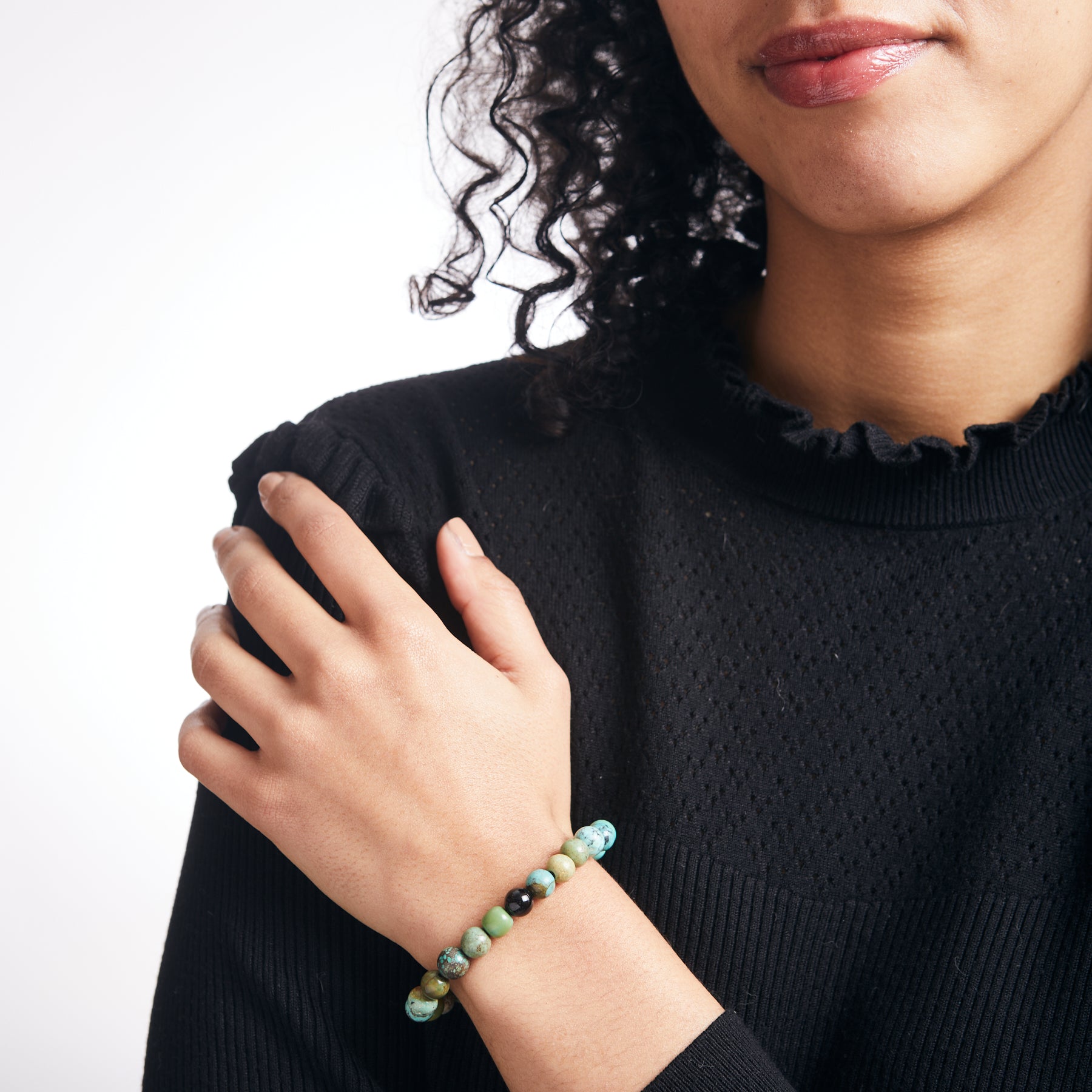 Tibetan Turquoise and black tourmaline beaded bracelets on model