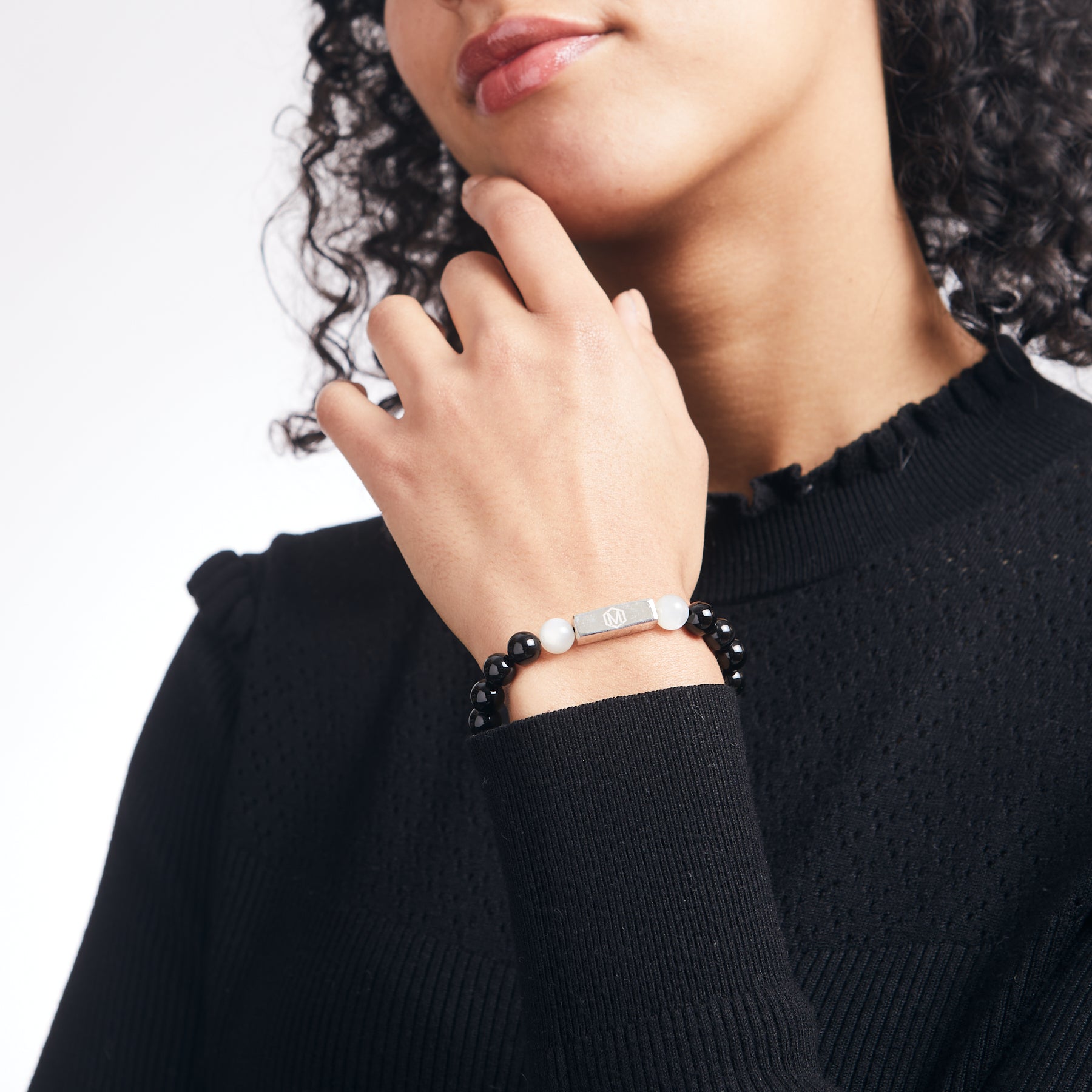 Black tourmaline and White Moonstone beaded bracelet on model