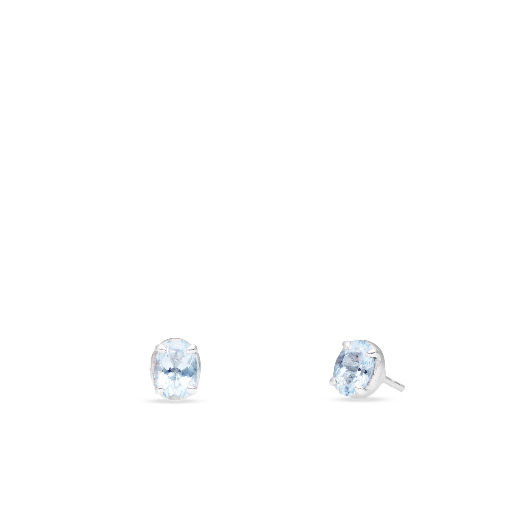 Aquamarine faceted oval with claw setting stud earrings