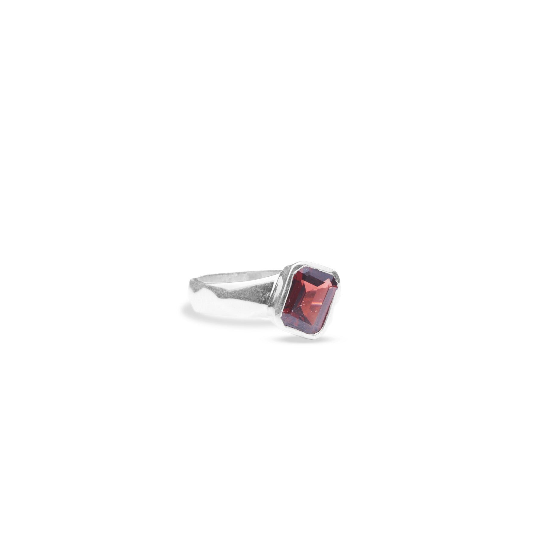 Garnet rectangle cushion ring offset with diamond cut band front angle  