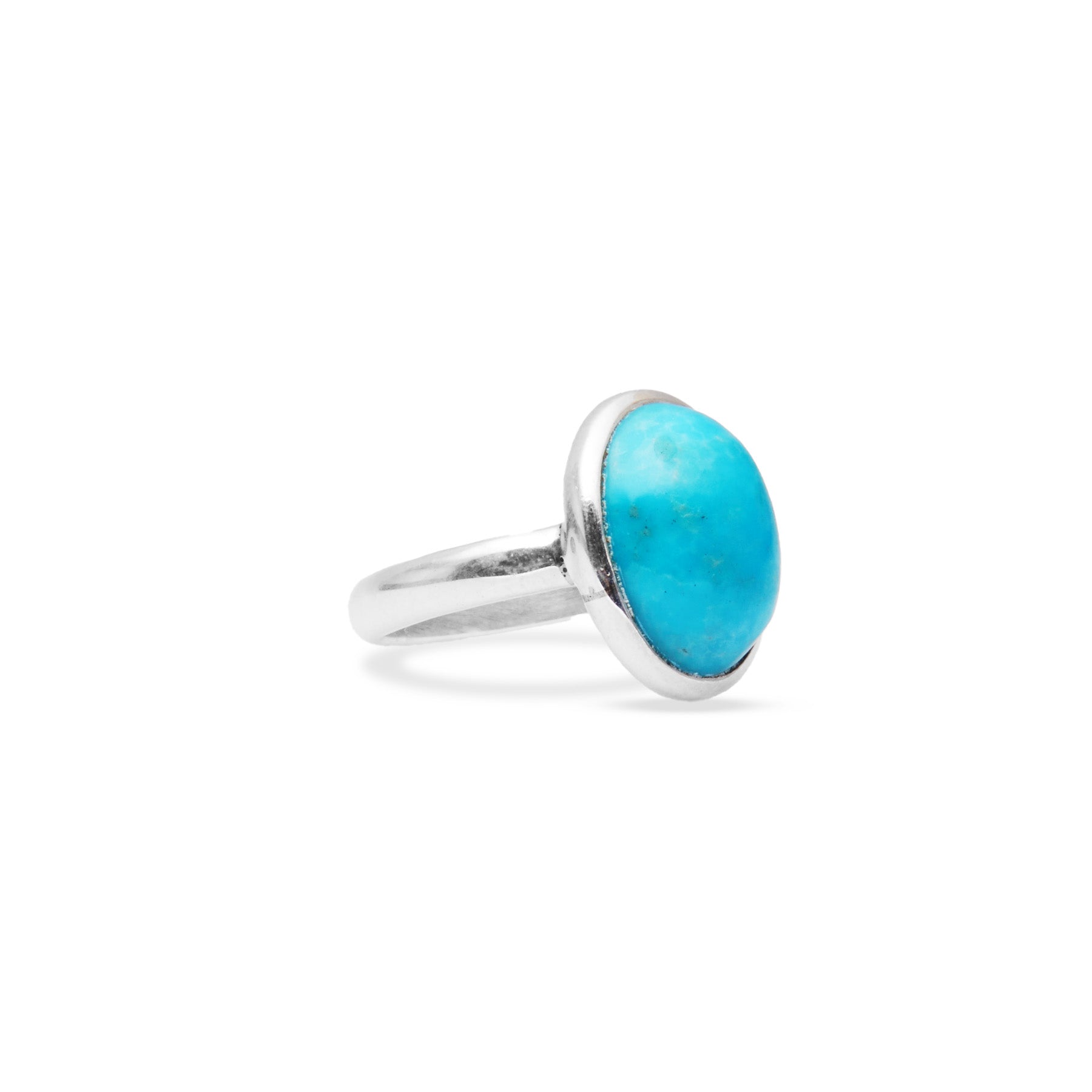 Feroza Turquoise cabochon oval ring with bezel setting side angle