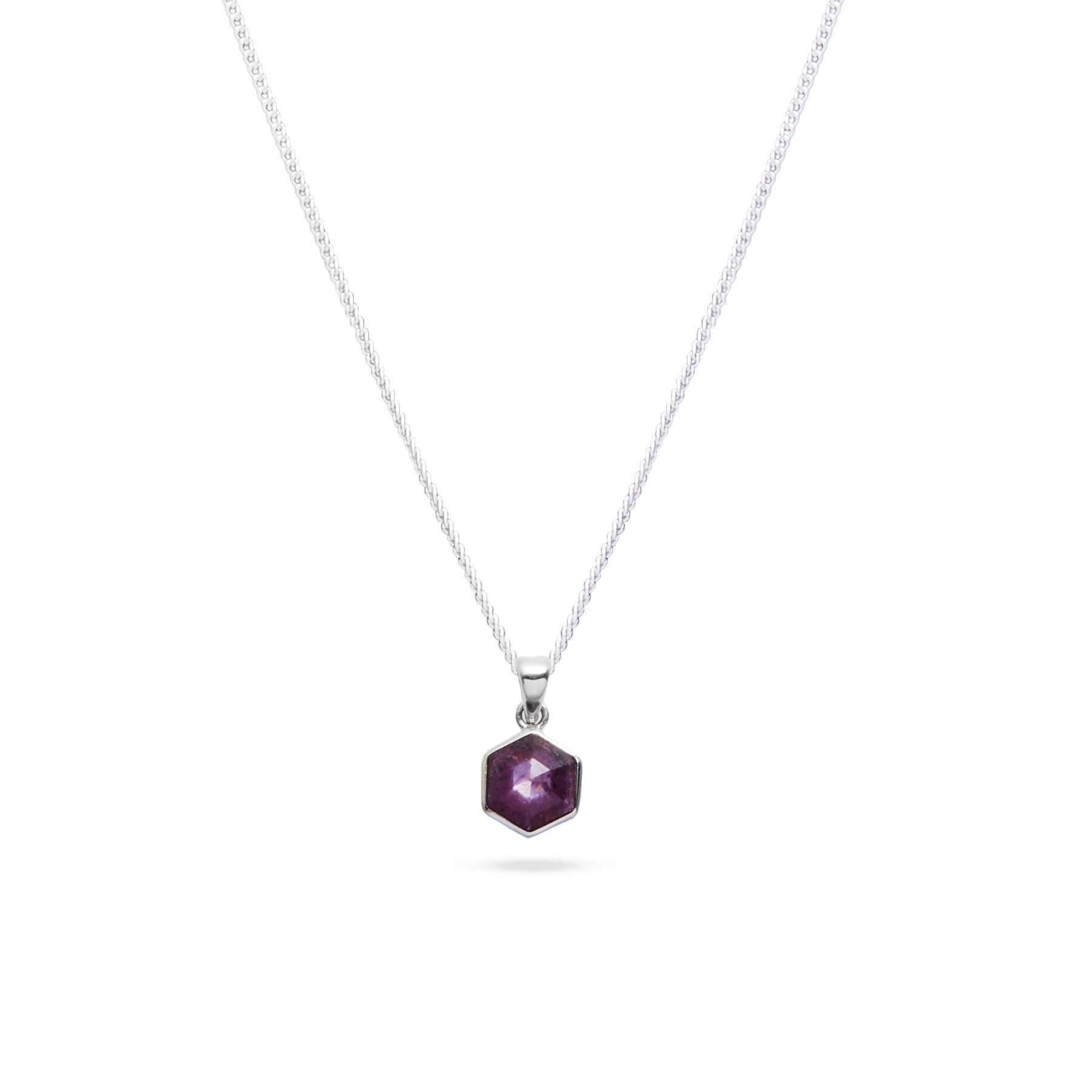 Ruby faceted hexagon pendant with bezel setting 