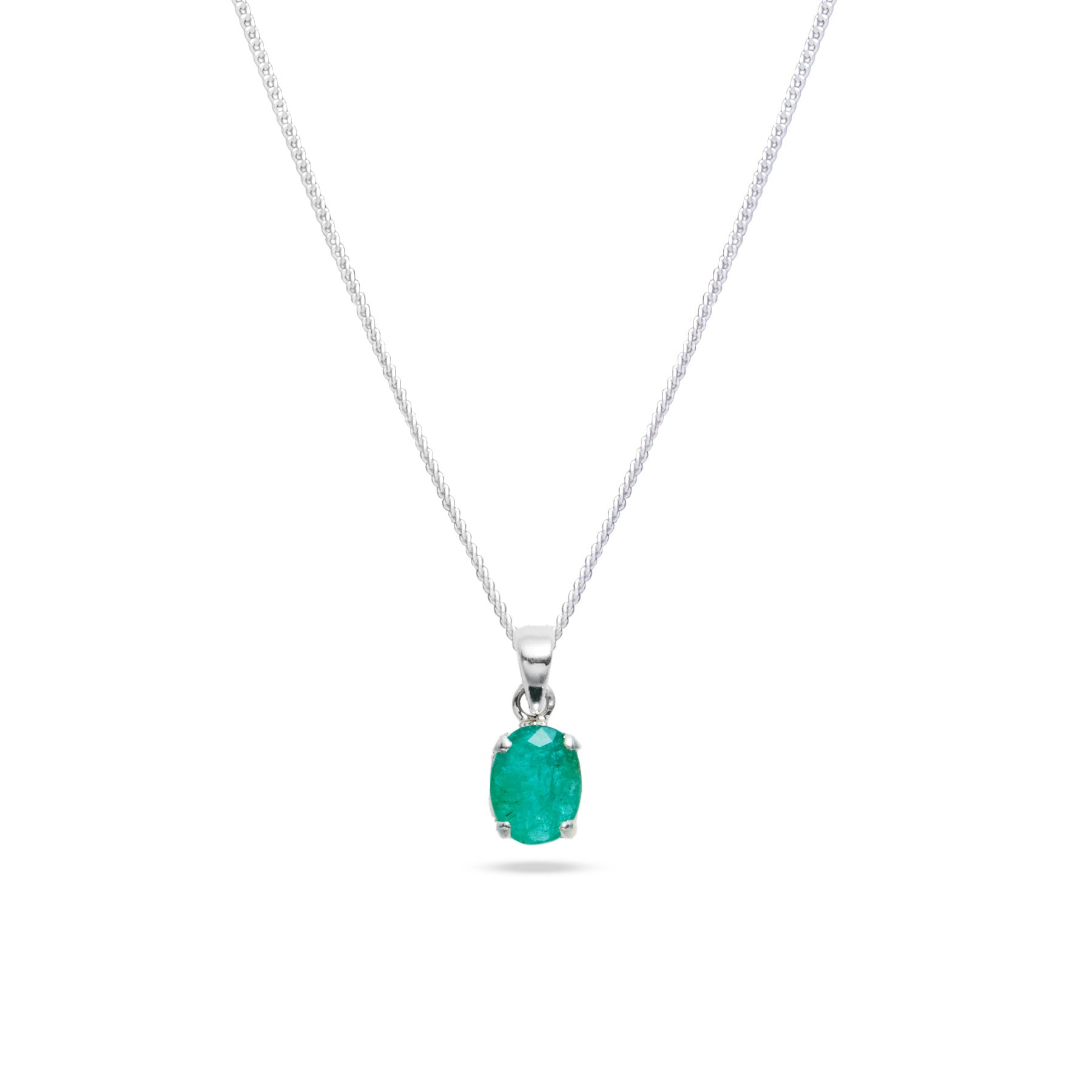 Emerald faceted oval claw set pendant 