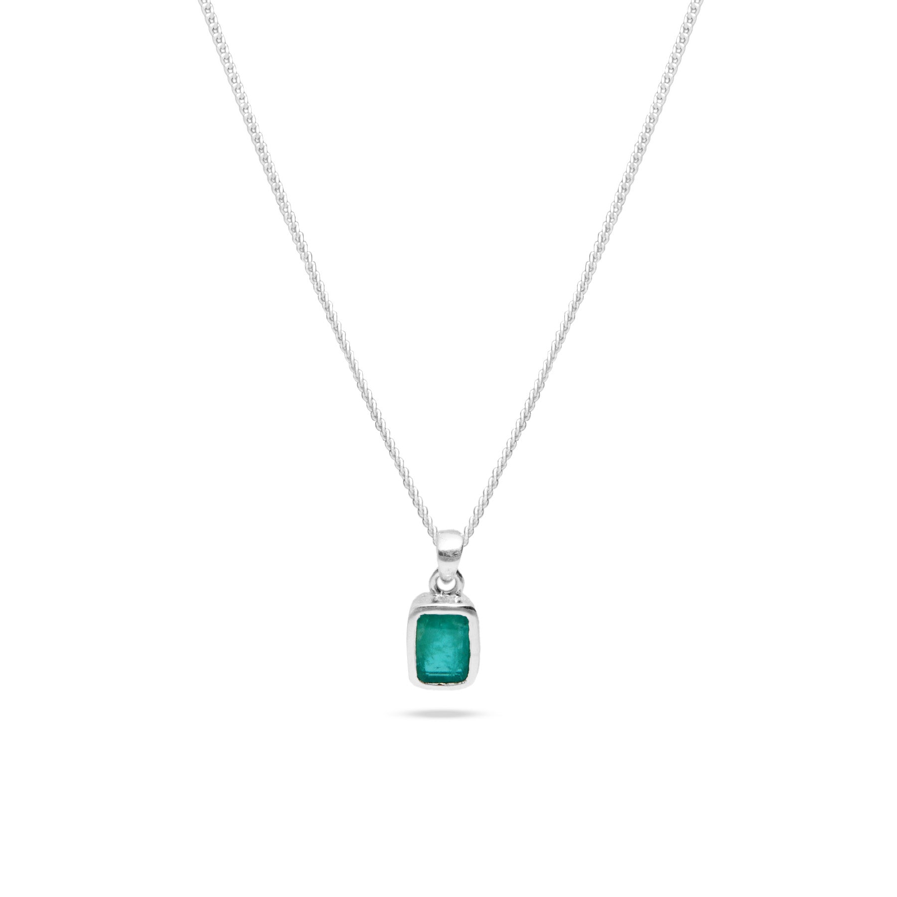 Emerald faceted rectangle hammered bezel set pendant 