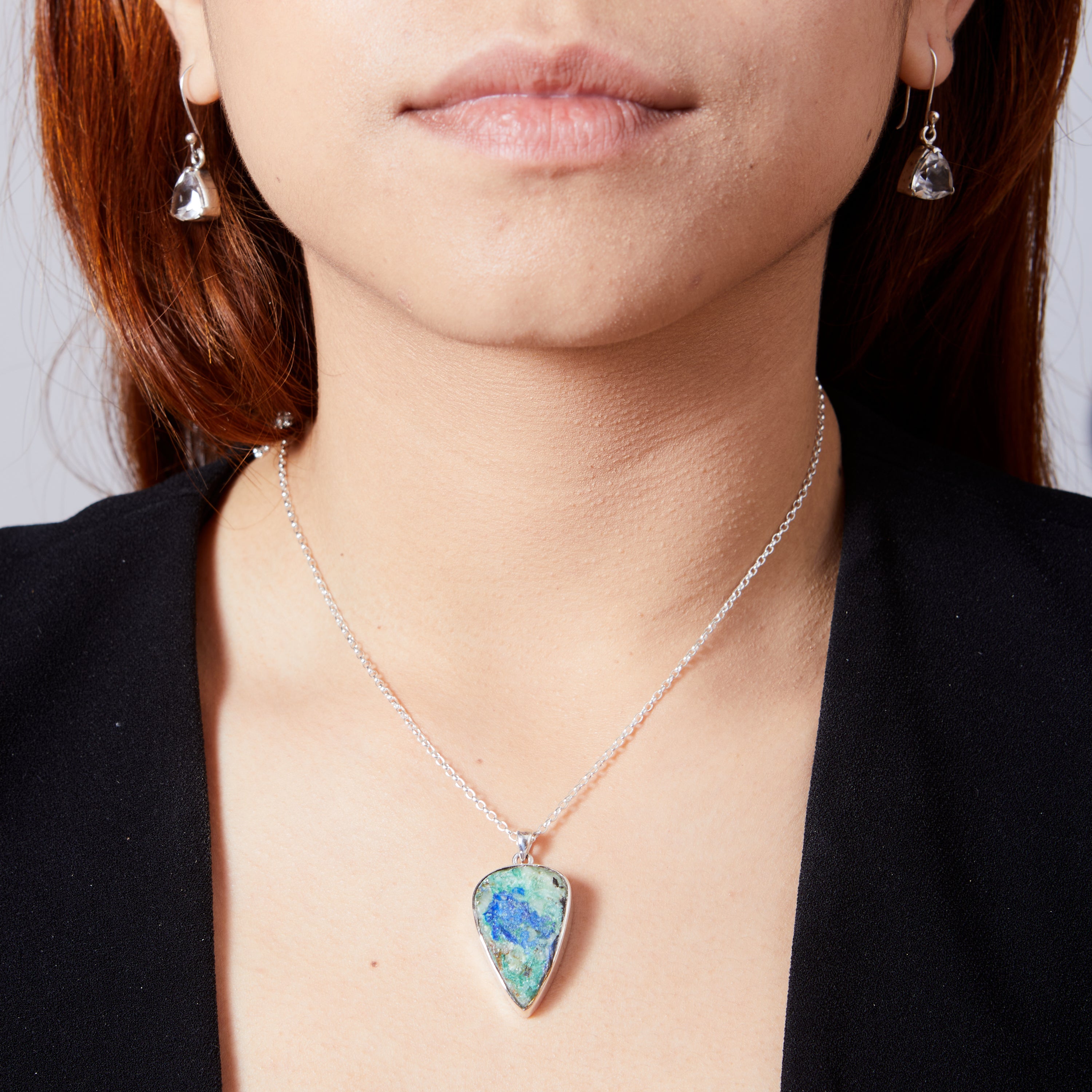 Azurite Chrysocolla inverted teardrop rough pendant with bezel set  on model