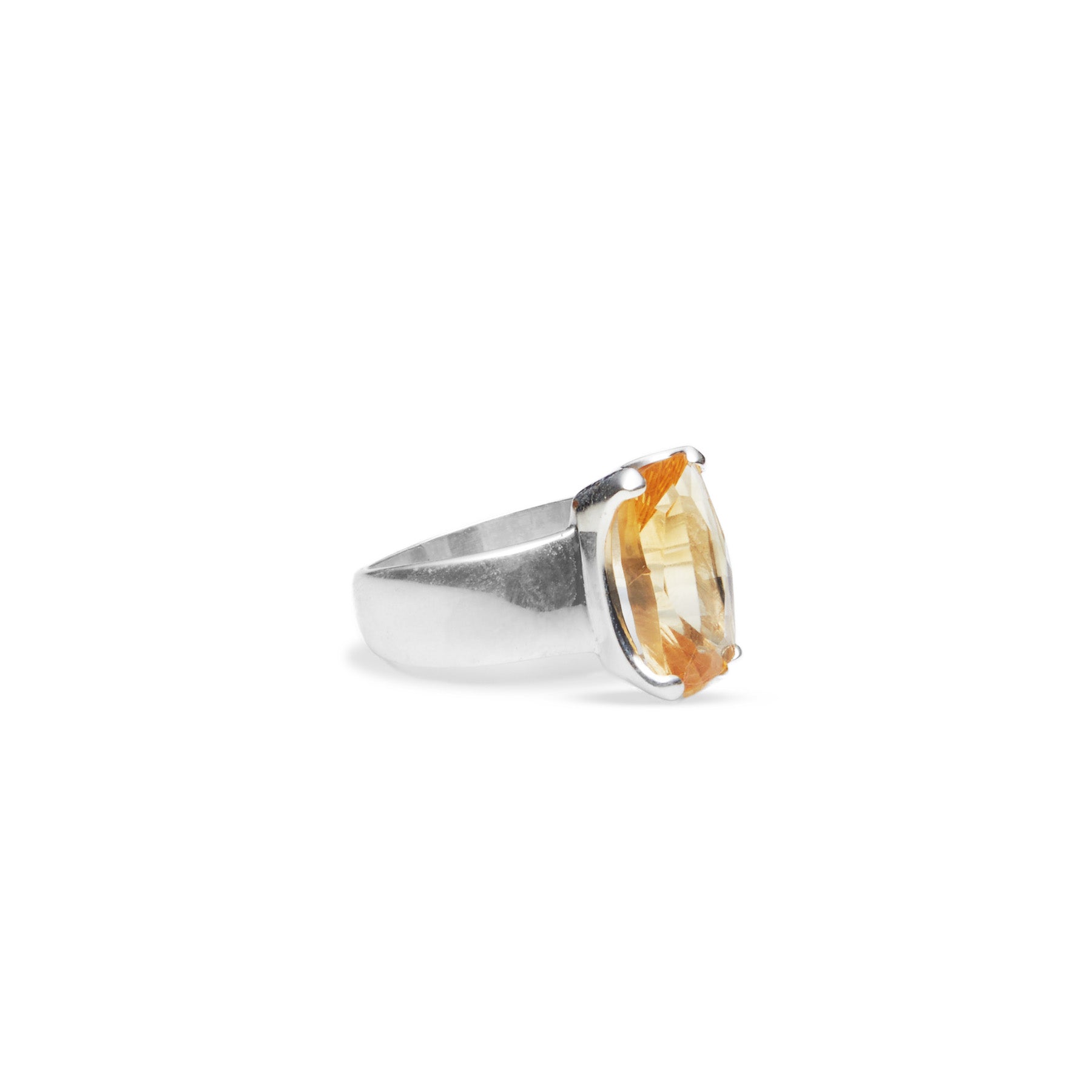 Citrine faceted ring with claw setting on thick band side angle