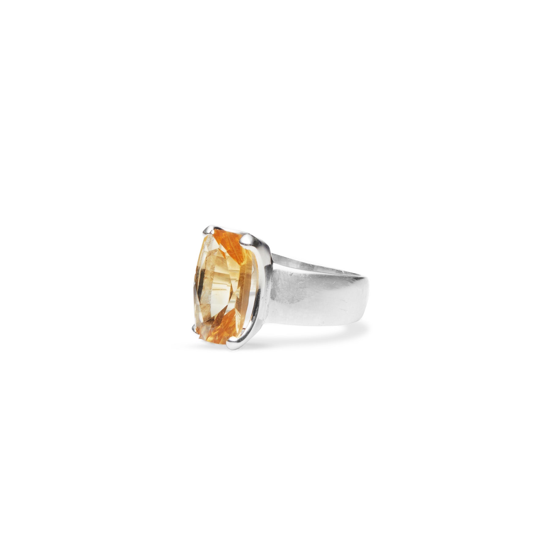 Citrine faceted ring with claw setting on thick band side angle