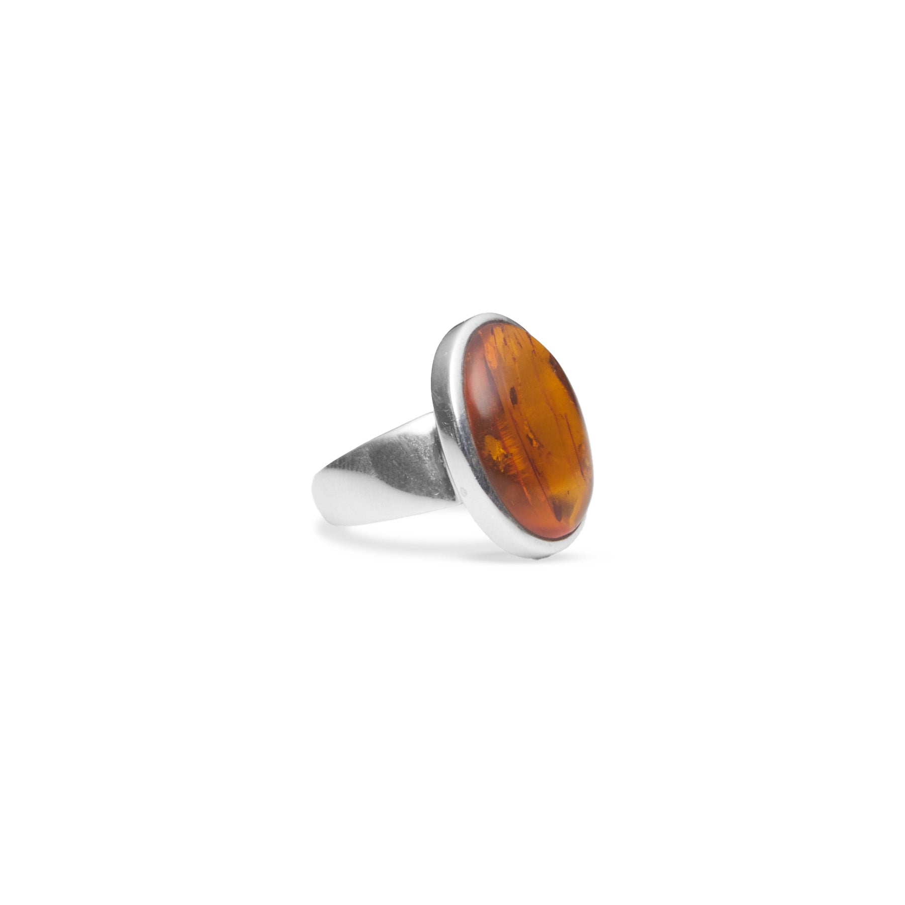 Amber cabochon oval bezel set ring 