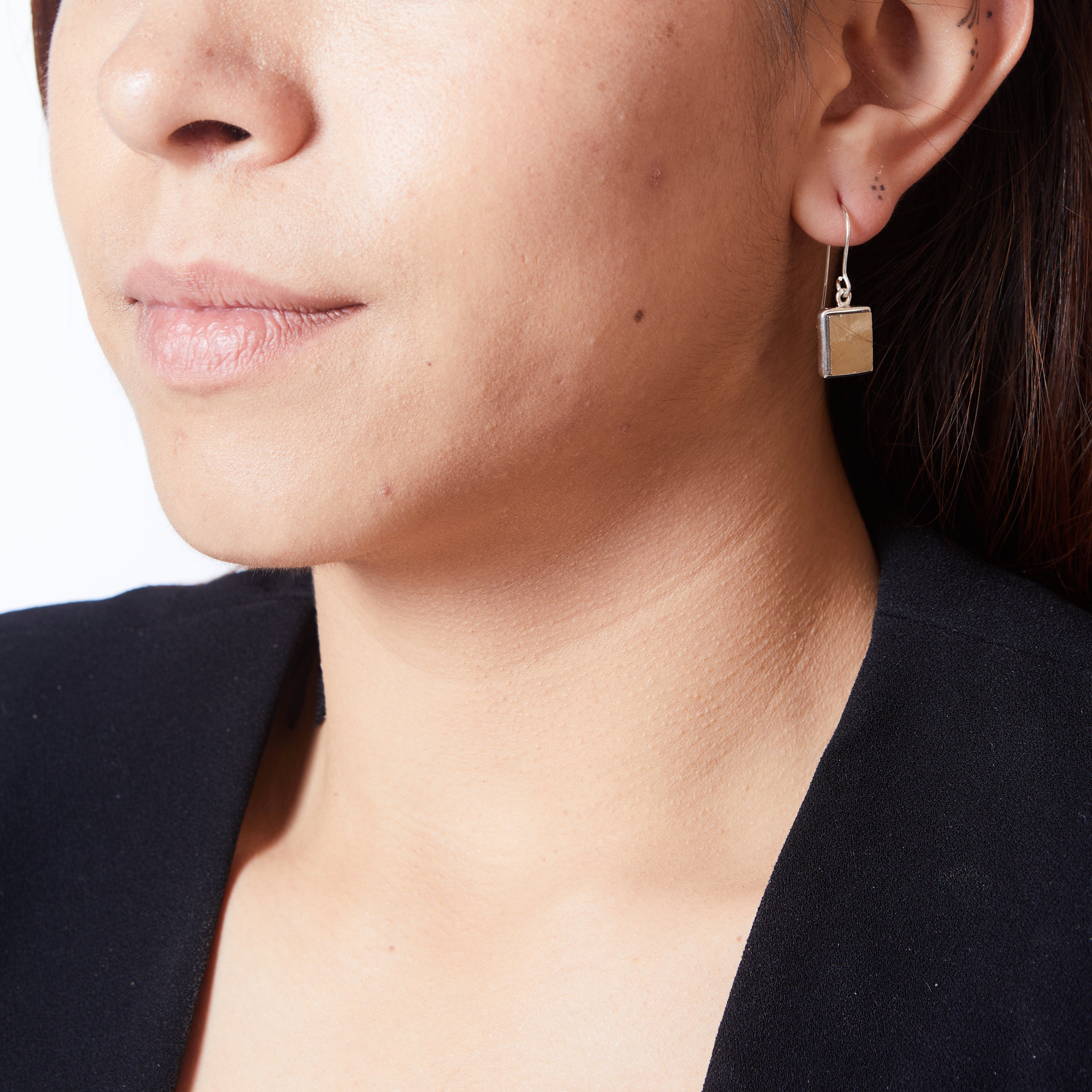 Pyrite rectangle bezel set drop earrings on model