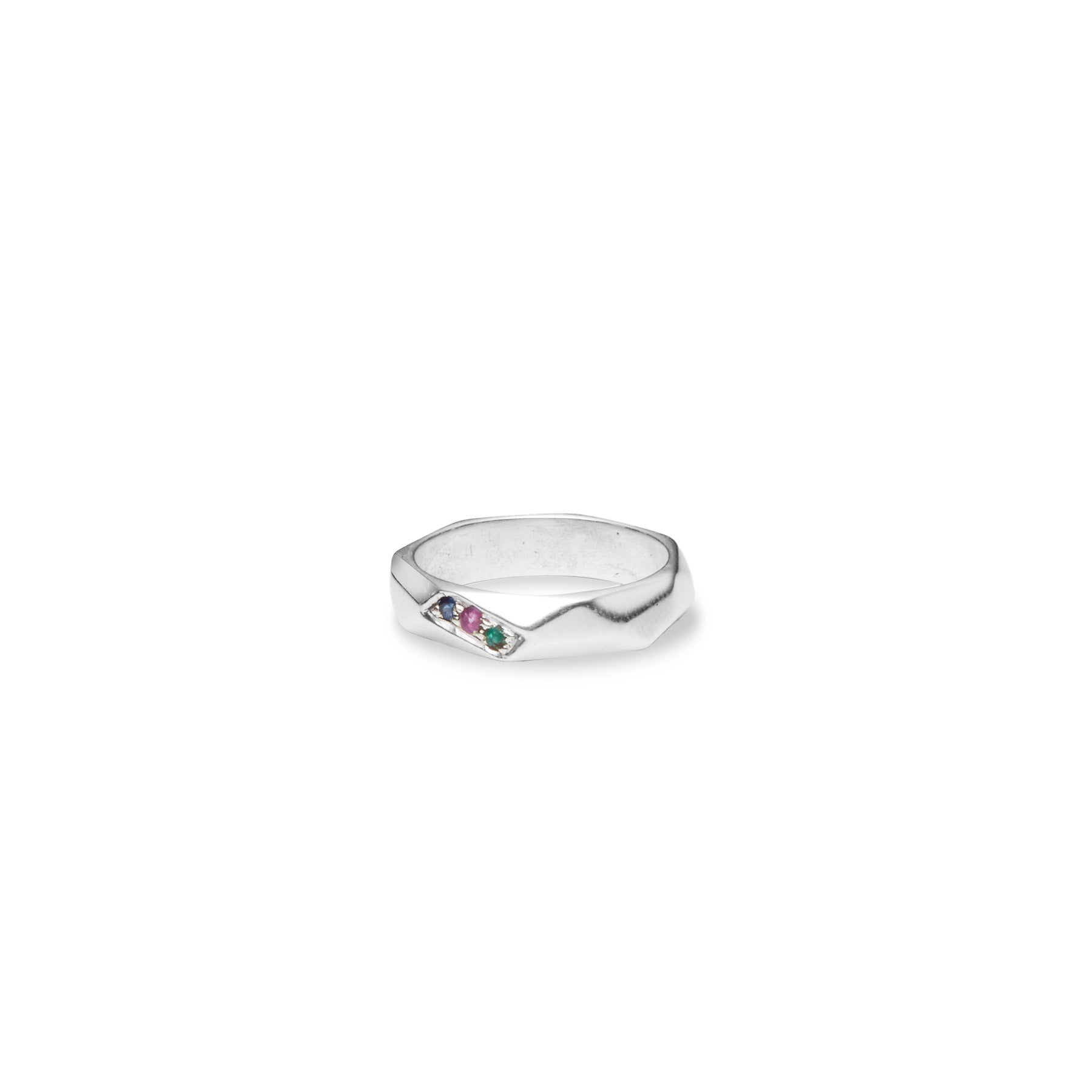 emerald sapphire ruby ring with hex cut band side angle