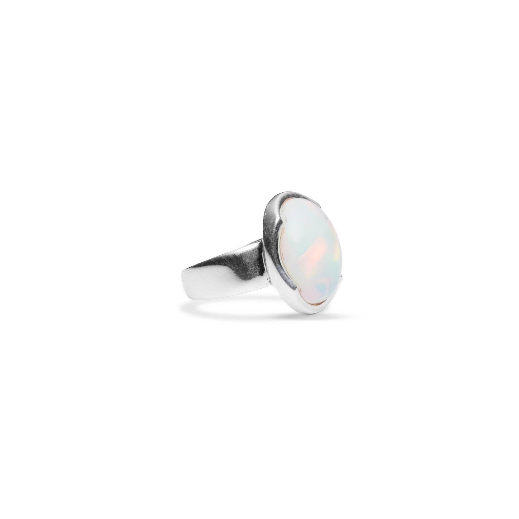 opal oval cabochon ring with wave setting and thick band