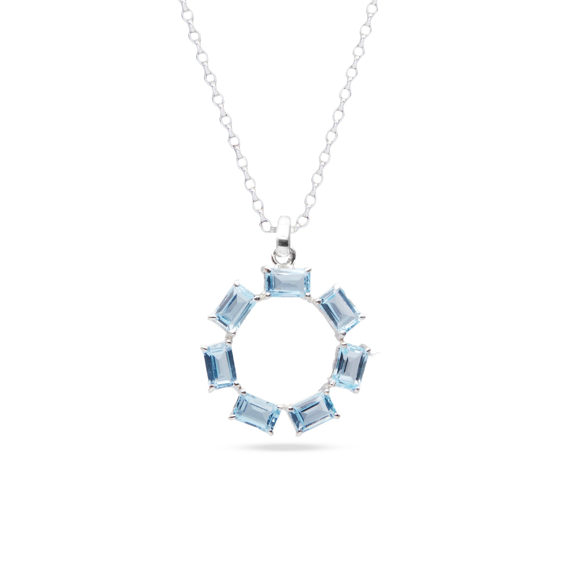 Blue Topaz rectangle faceted claw set round pendant 