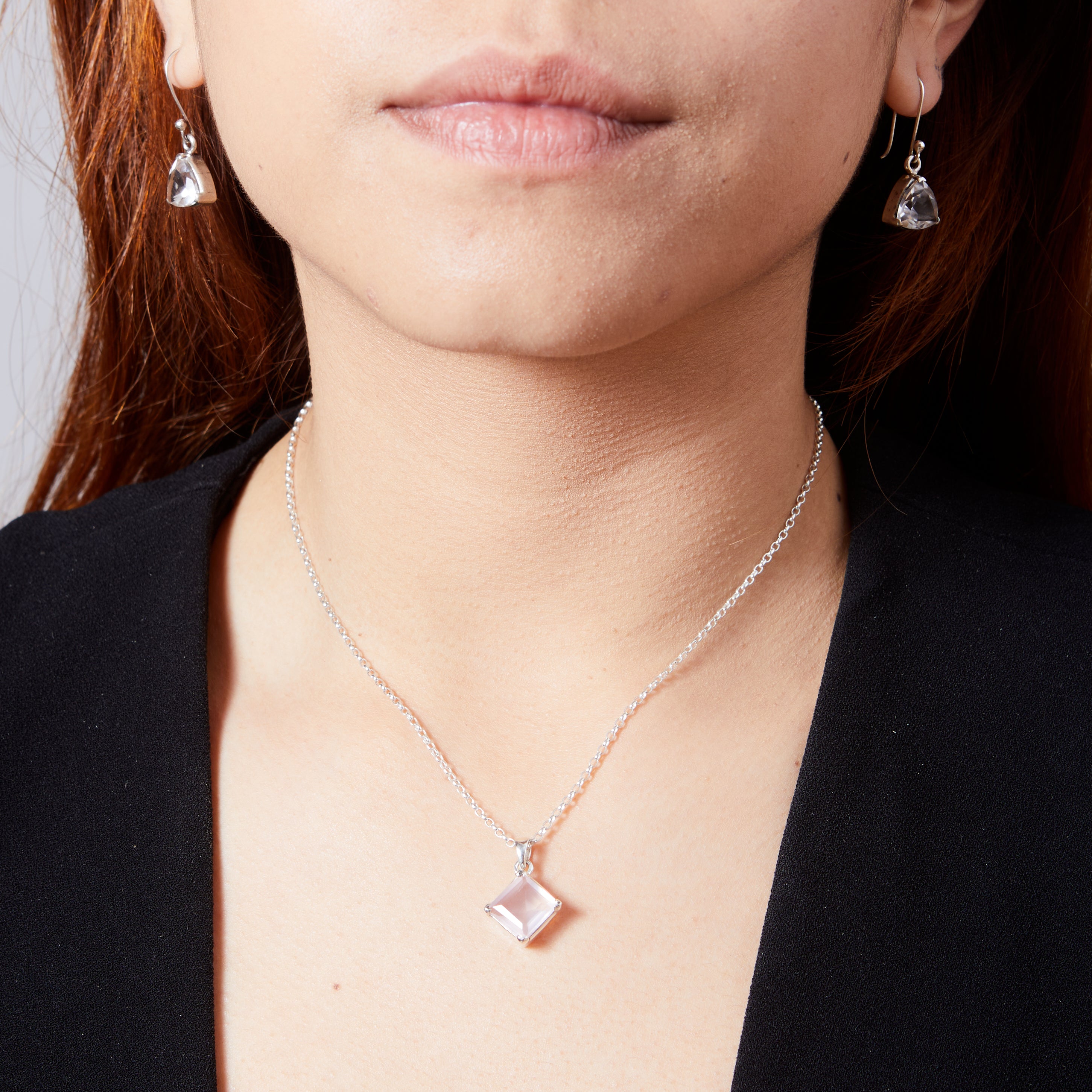 Rose Quartz square diamond set faceted pendant with clamp setting on model