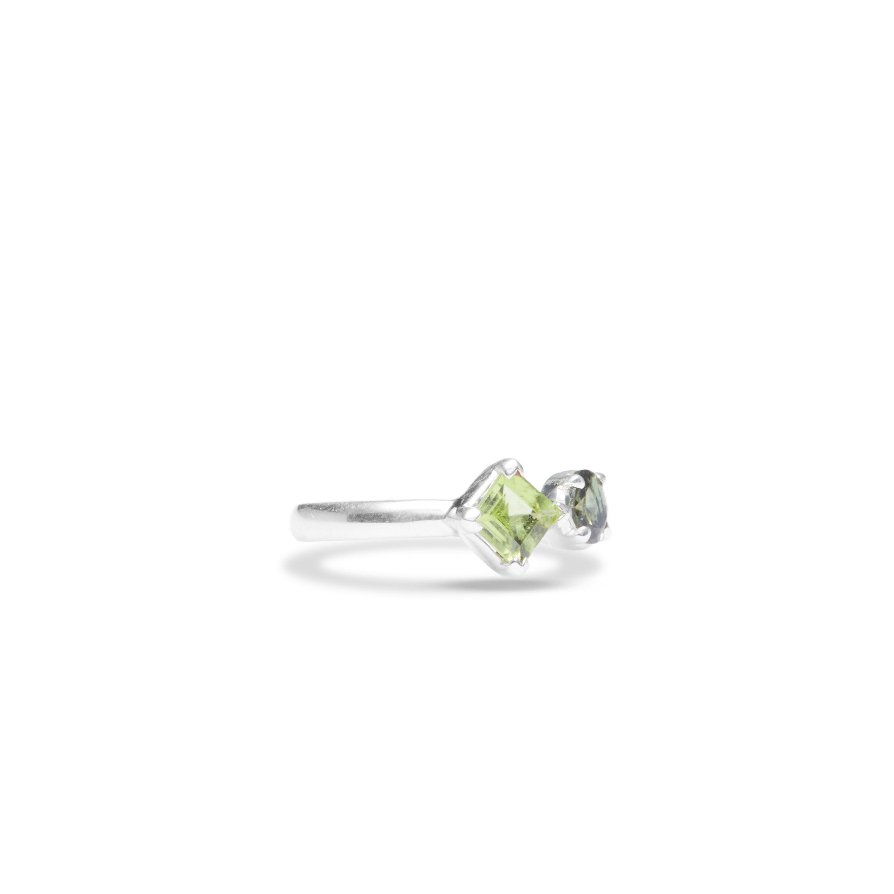 Peridot and Green Tourmaline round faceted claw set ring