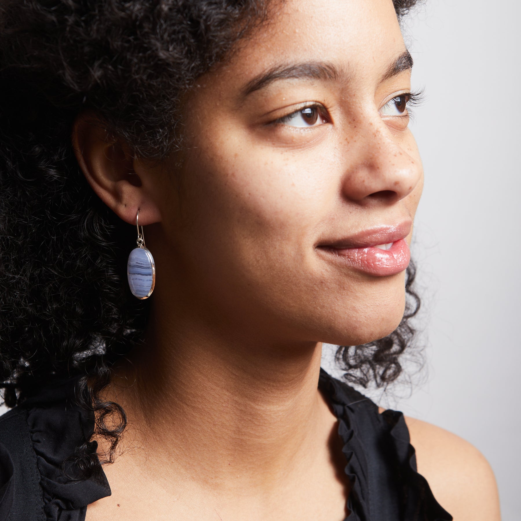 Blue lace agate oval drop earrings  on model