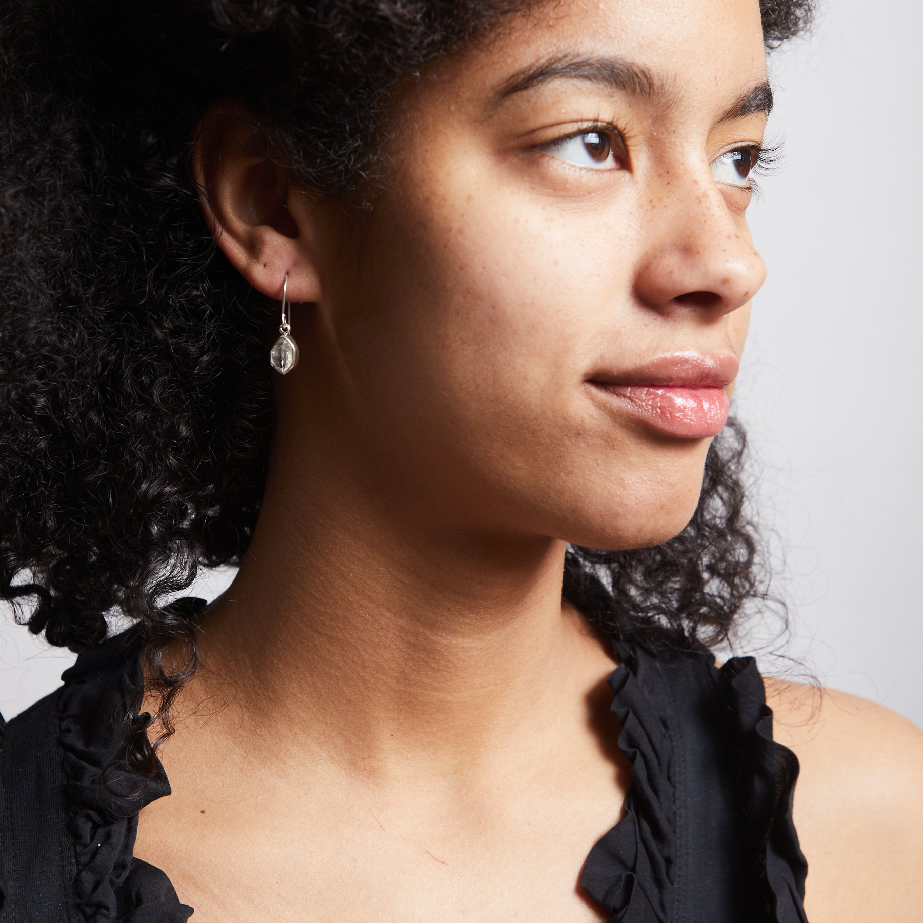 Herkimer Diamond freeform drop earrings on model