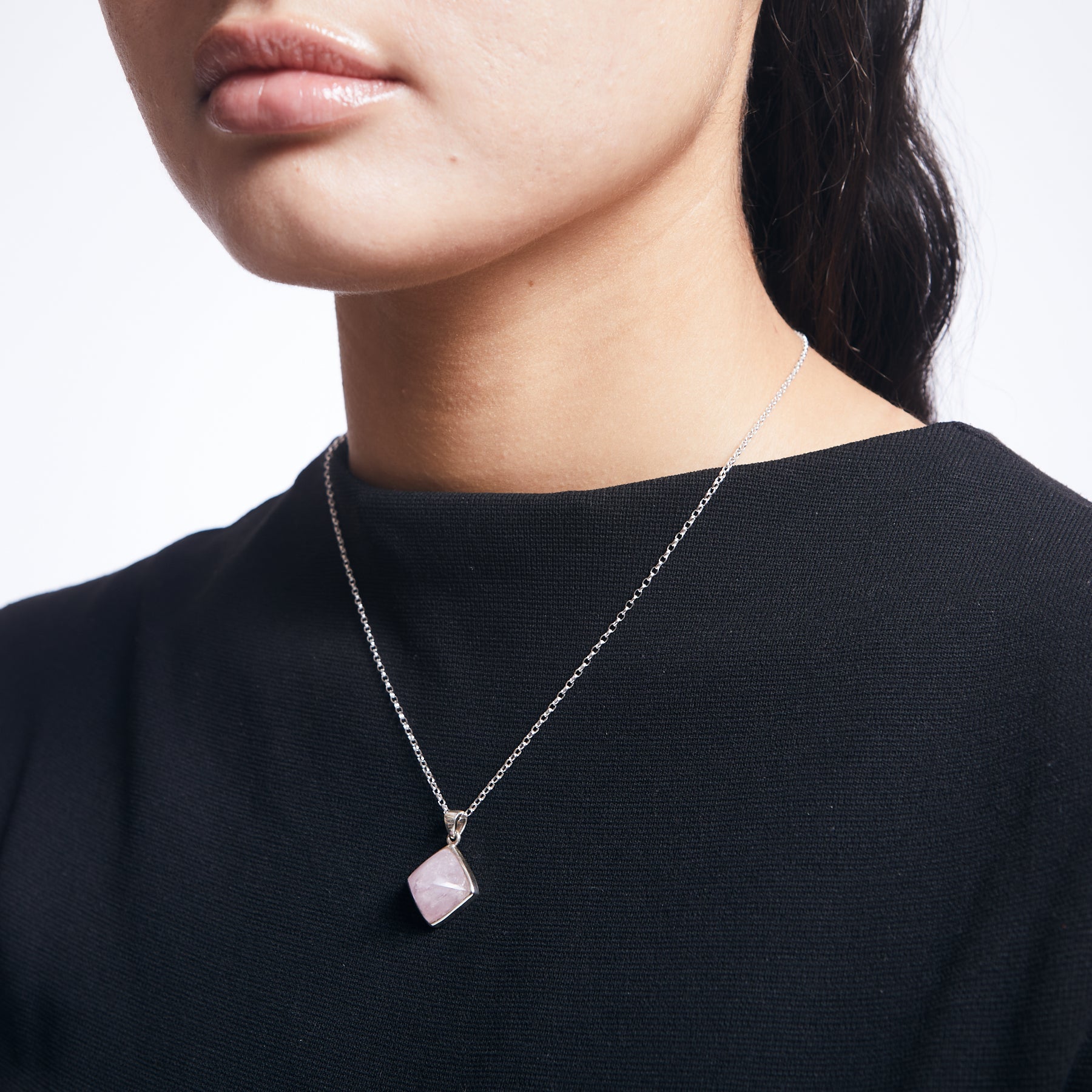 Morganite pendant with sugar loaf cut with sterling silver chain on model