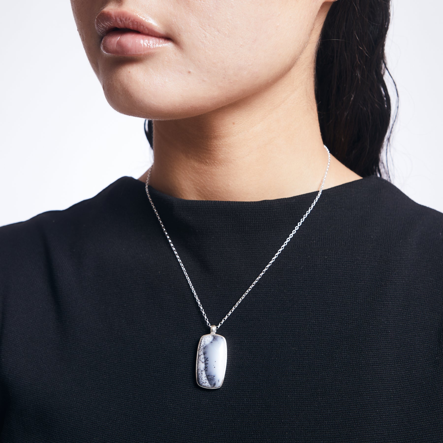 Dendritic opal on sterling silver chain on model