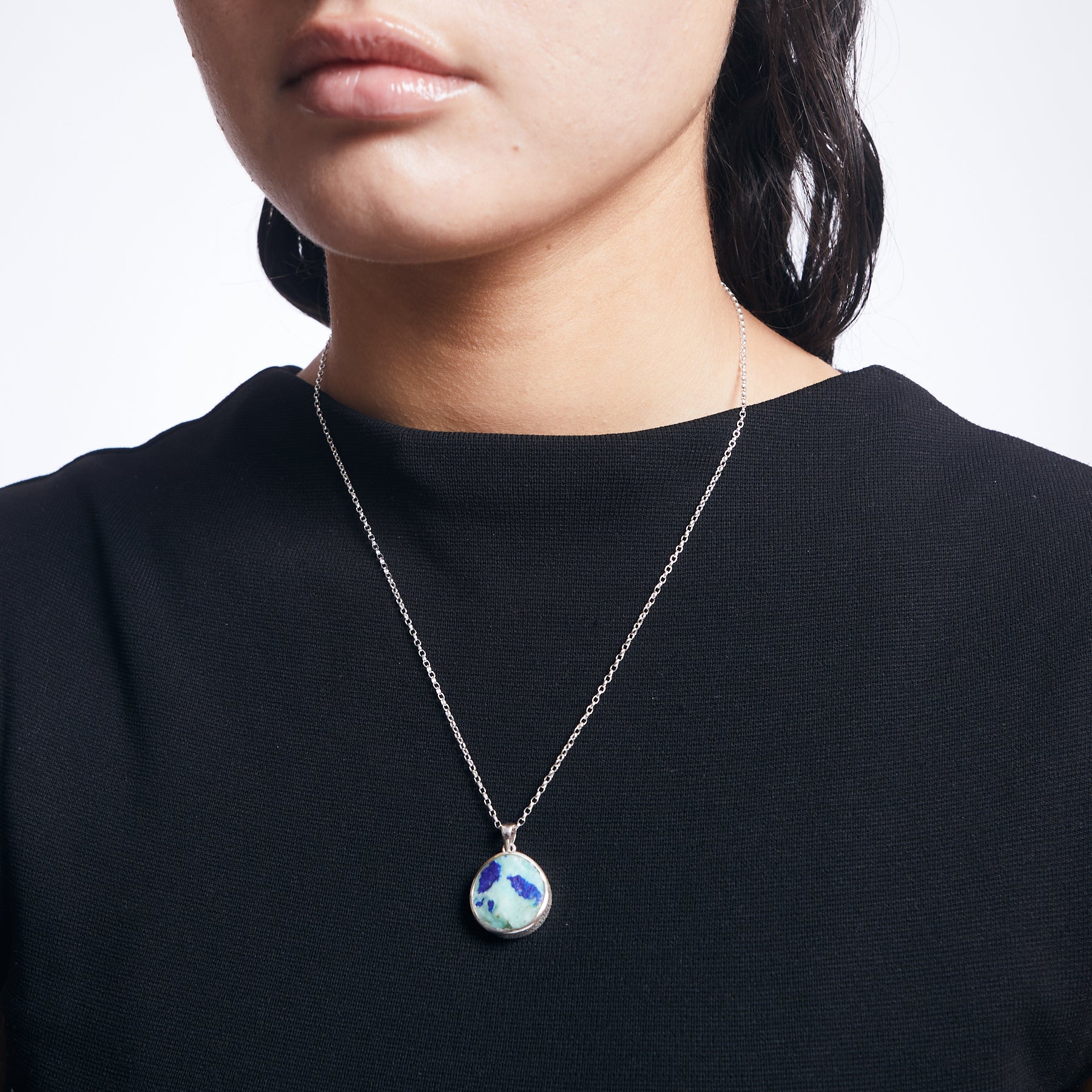 Azurite Chrysocolla rough pendant on sterling silver chain on model