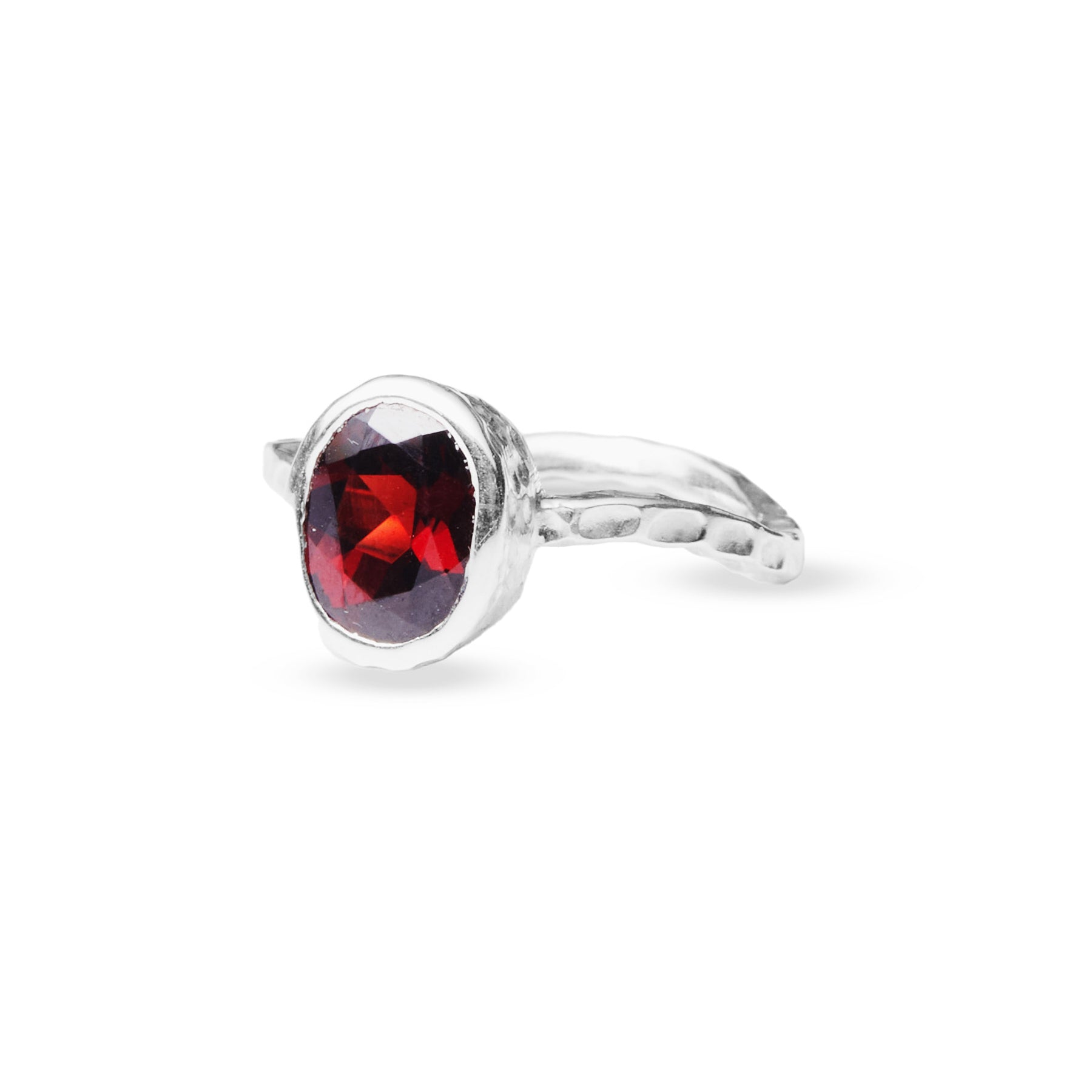 Garnet Oval faceted ring with bezel setting textured wave band side angle