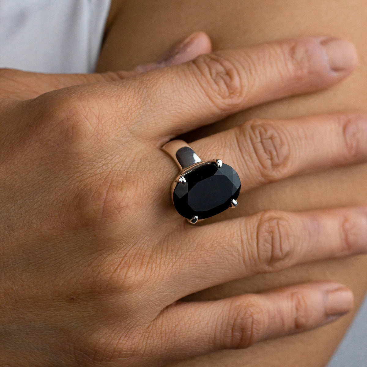 Black onyx store ring which finger